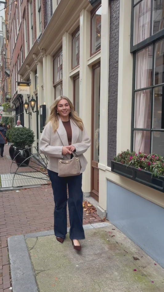 SPIJKERBROEK HIGH WAIST MET ZAK DETAIL